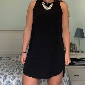 Little black dress with chunky pearl necklace